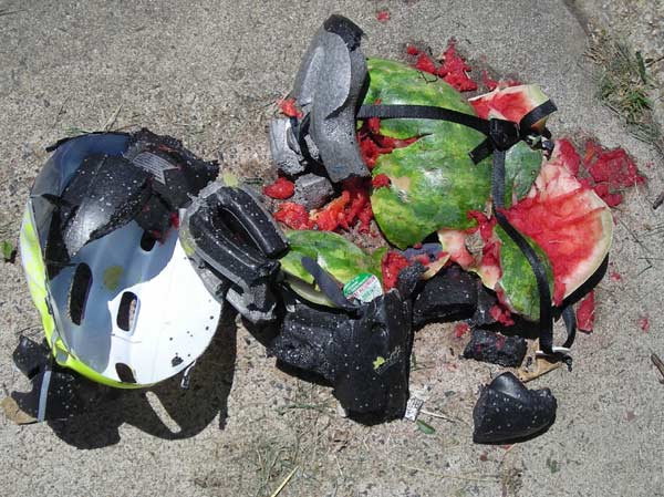 helmet smushed by car wheel